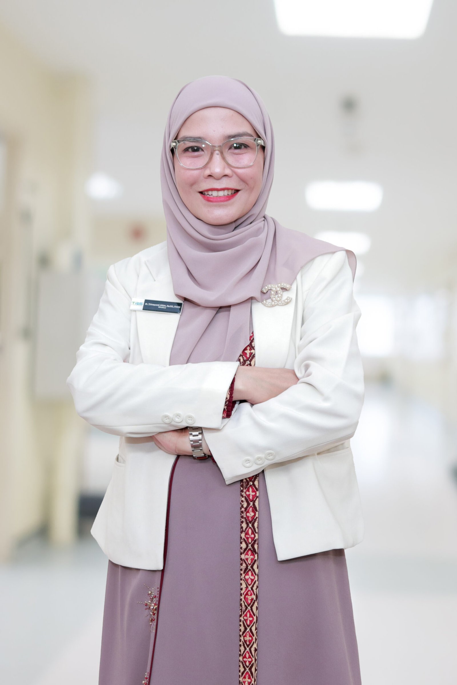 dr. Trimayanti Olfah, Sp.OG